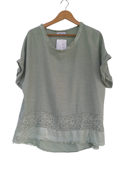 Blusa verde bordada 25000