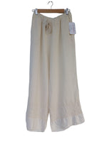 Pantalón crema 24990