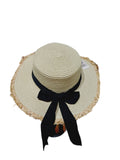Sombrero beige tejido con detalle de chonga